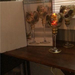 Elegant hand painted hurricane globes. Add an LED light for a warm glow.